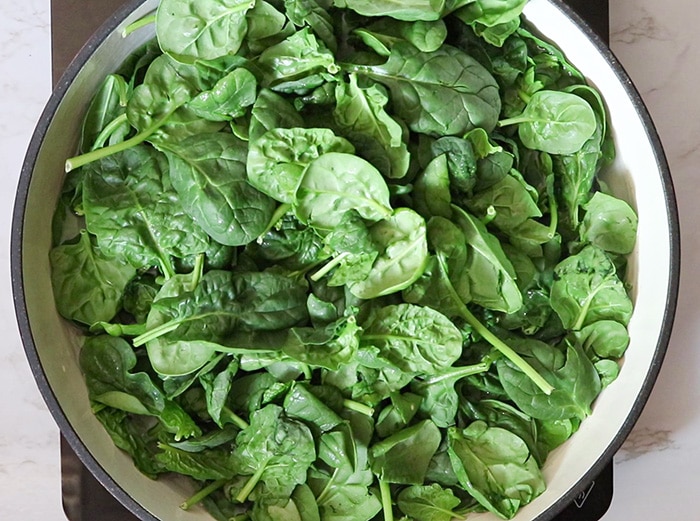 Add spinach to the pan