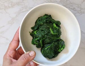 Blanched spinach in the bowl