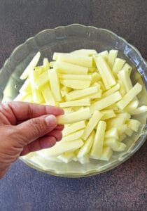 Potatoes cut into strips