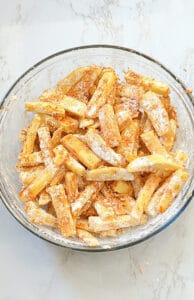 Coat the potatoes