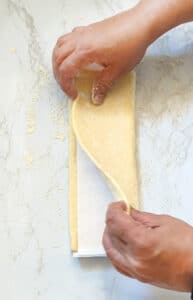Unfold puff pastry sheets