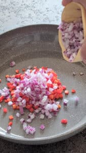 Sauté onion and bell peppers